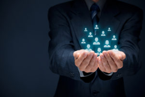 Customer care care for employees labor union human resources pool life insurance employment agency and marketing segmentation concepts. Protecting gesture of businessman or personnel and icons representing group of people.