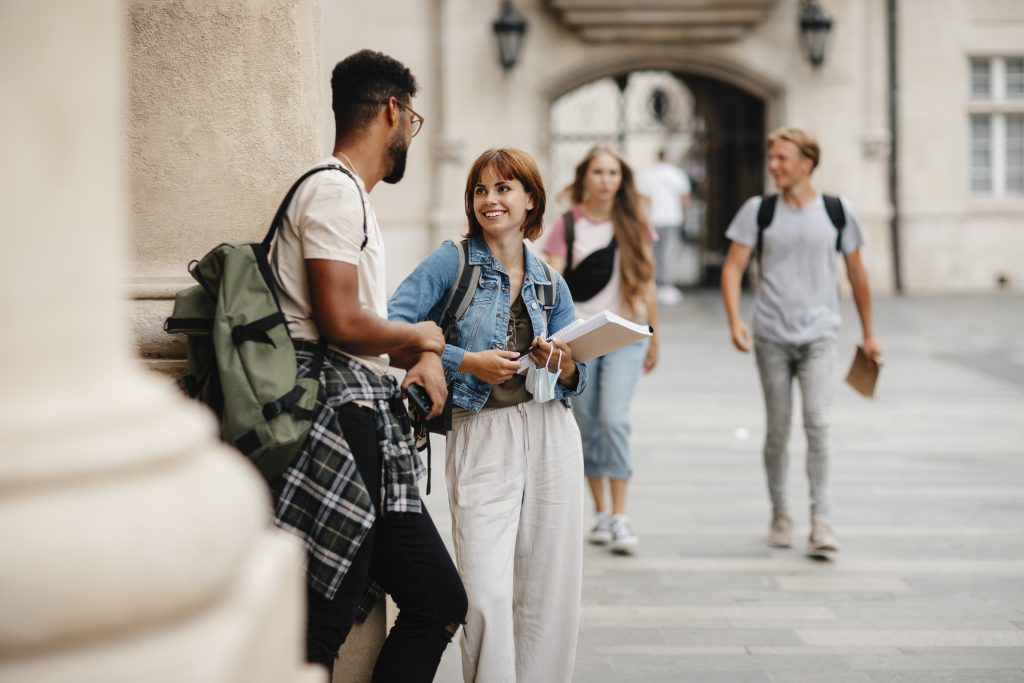 Students talking on college campus